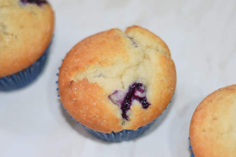 Super fast one-bowl classic blueberry muffins with fresh or frozen blueberries and a crispy sugar top - easy recipe!