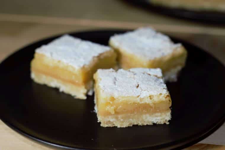 Easy classic lemon bars - shortbread biscuit base, lemon curd filling and icing sugar dusting