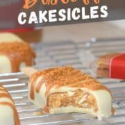 white chocolate biscoff cakesicles showing biscoff filling.