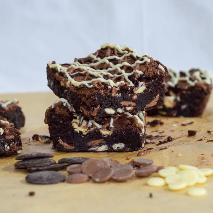 Fudgy triple chocolate brownies with melted triple chocolate drizzle