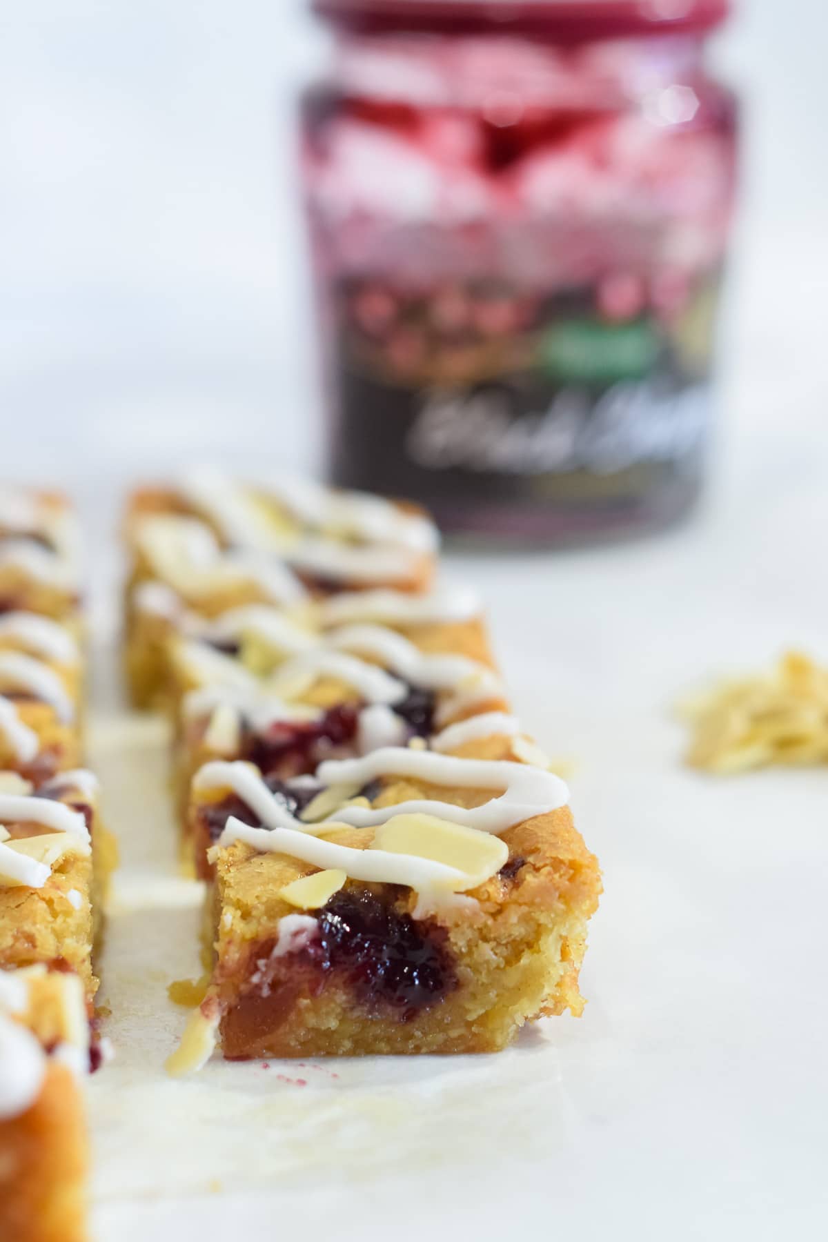 Double cherry Bakewell blondies recipe with glace cherries and cherry jam