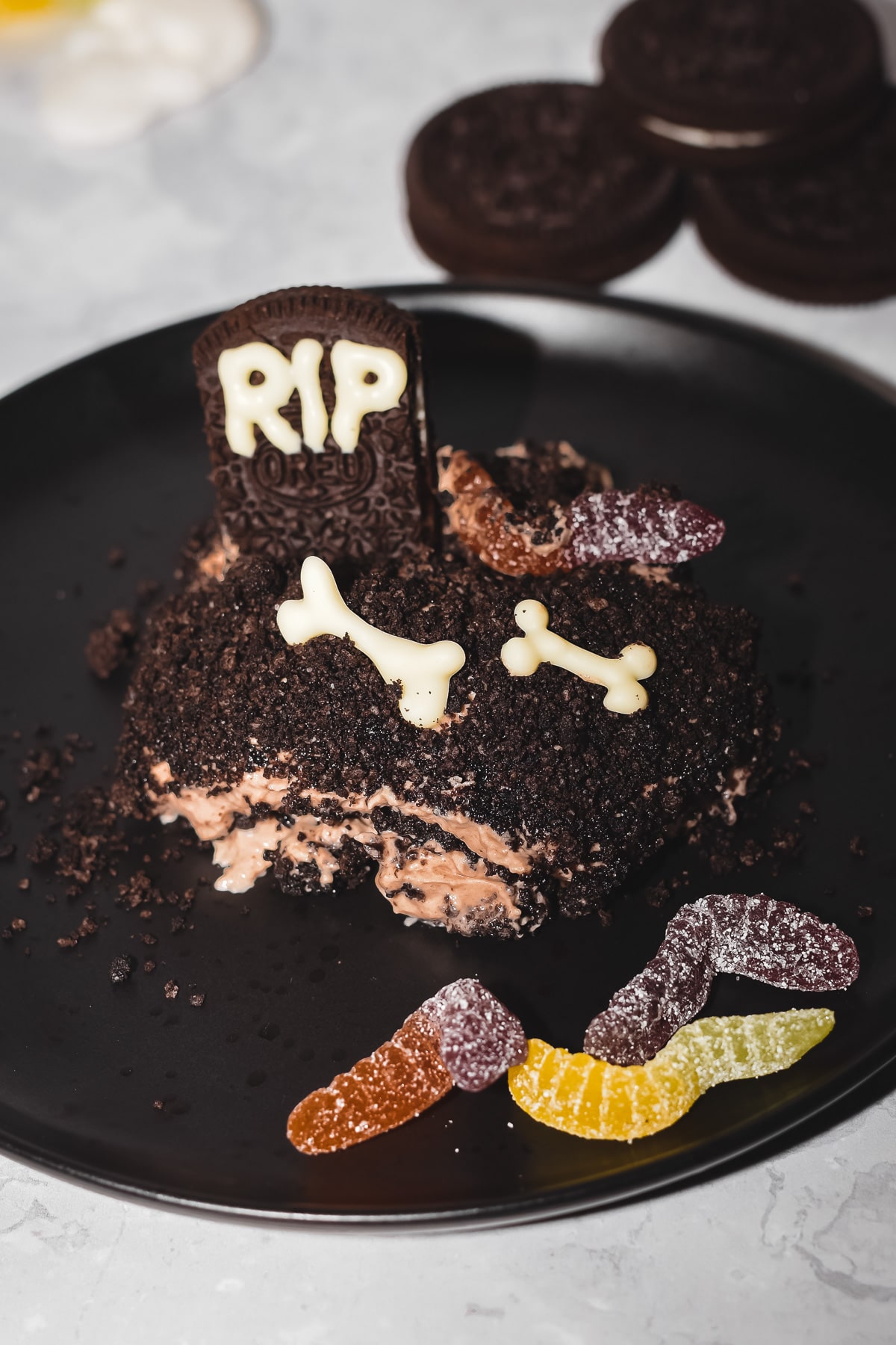 Halloween graveyard chocolate dirt cake slice