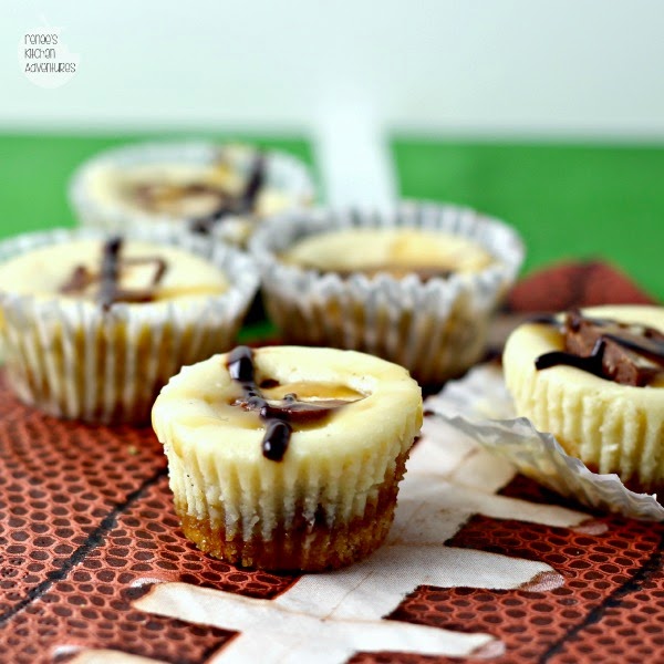 mini snickers cheesecake bites on an American football