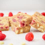 white chocolate chip raspberry blondies squares stacked