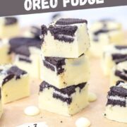stacked cookies and cream oreo fudge pieces with Oreos on top and white chocolate chips just 3 ingredients.