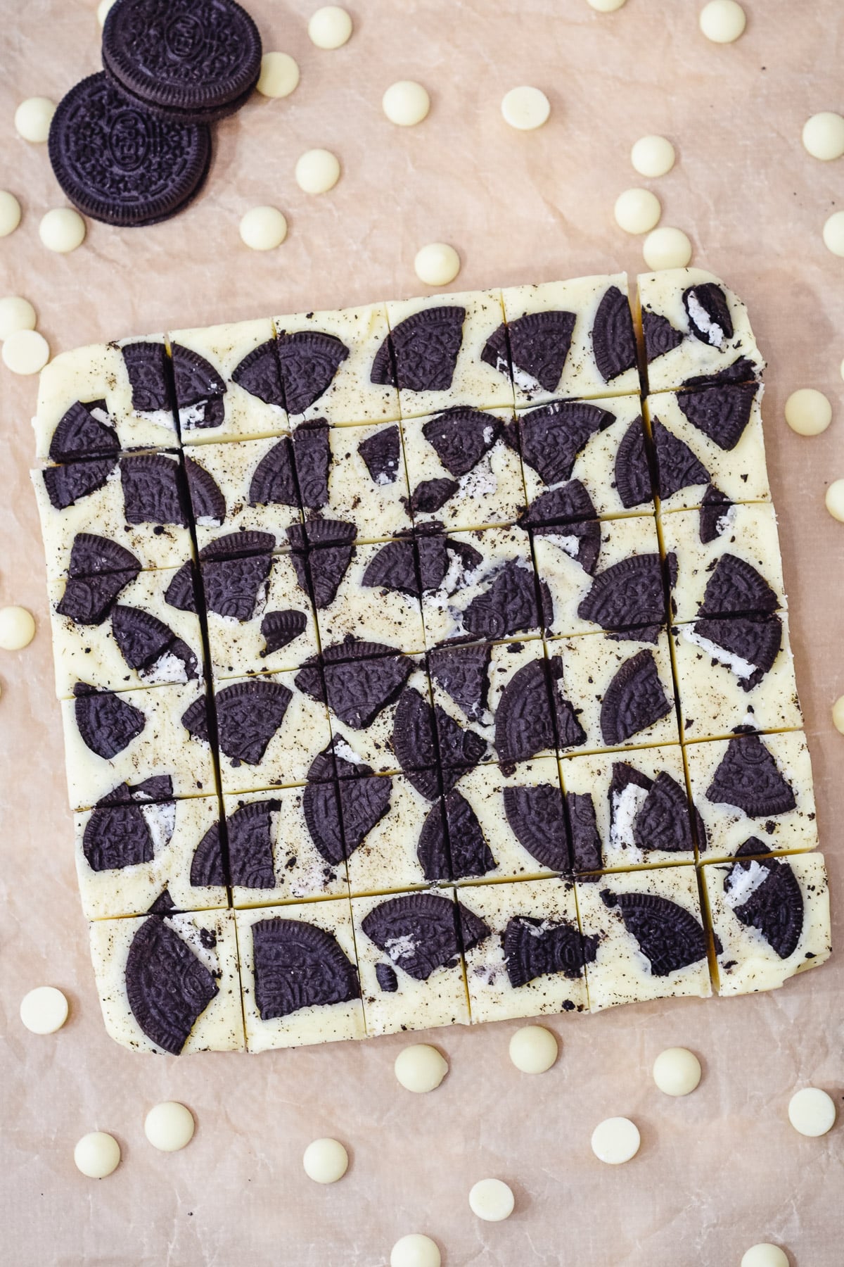 cookies and cream oreo fudge slab with Oreos and white chocolate chips.