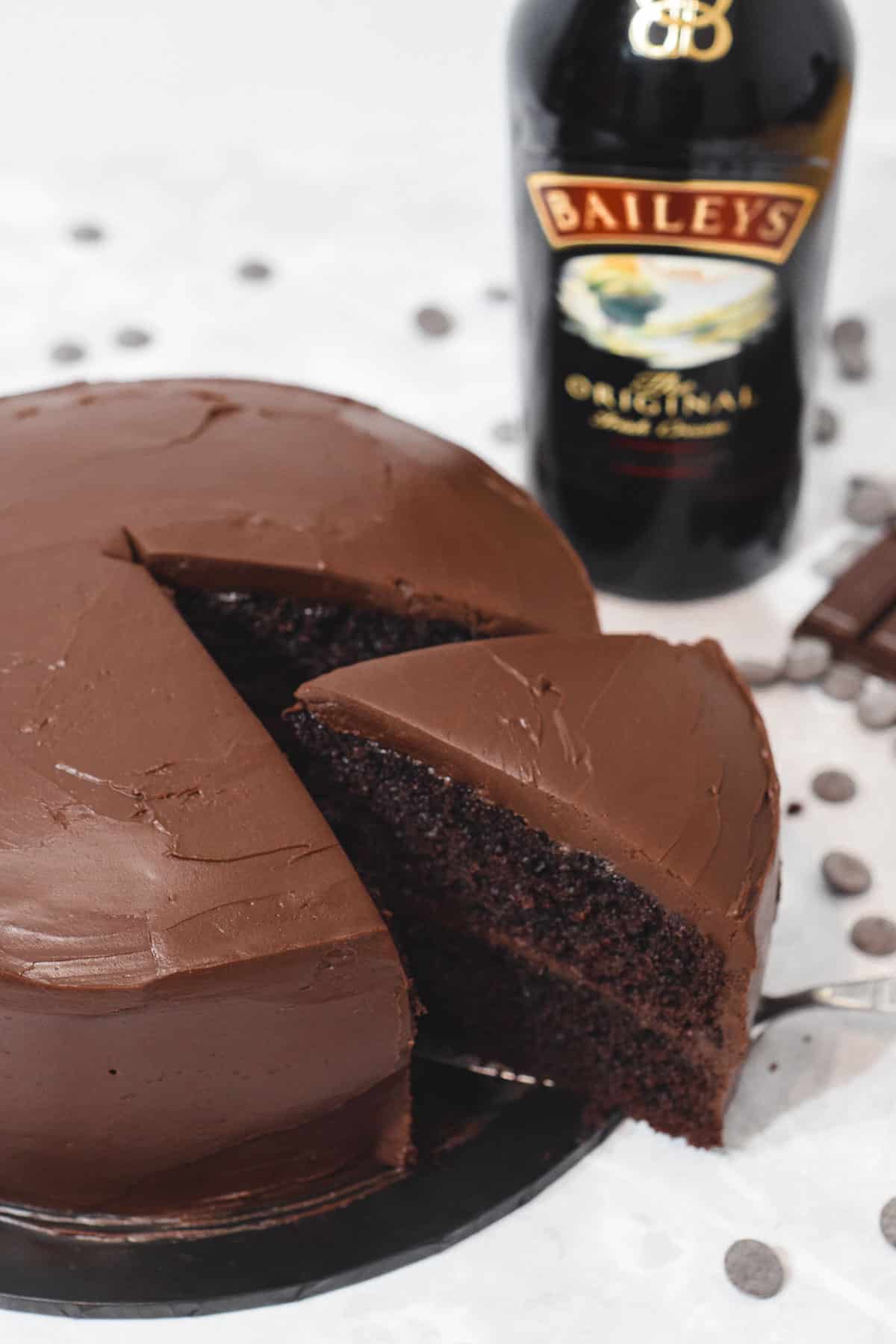 baileys chocolate mud layer cake with baileys chocolate ganache frosting sliced.