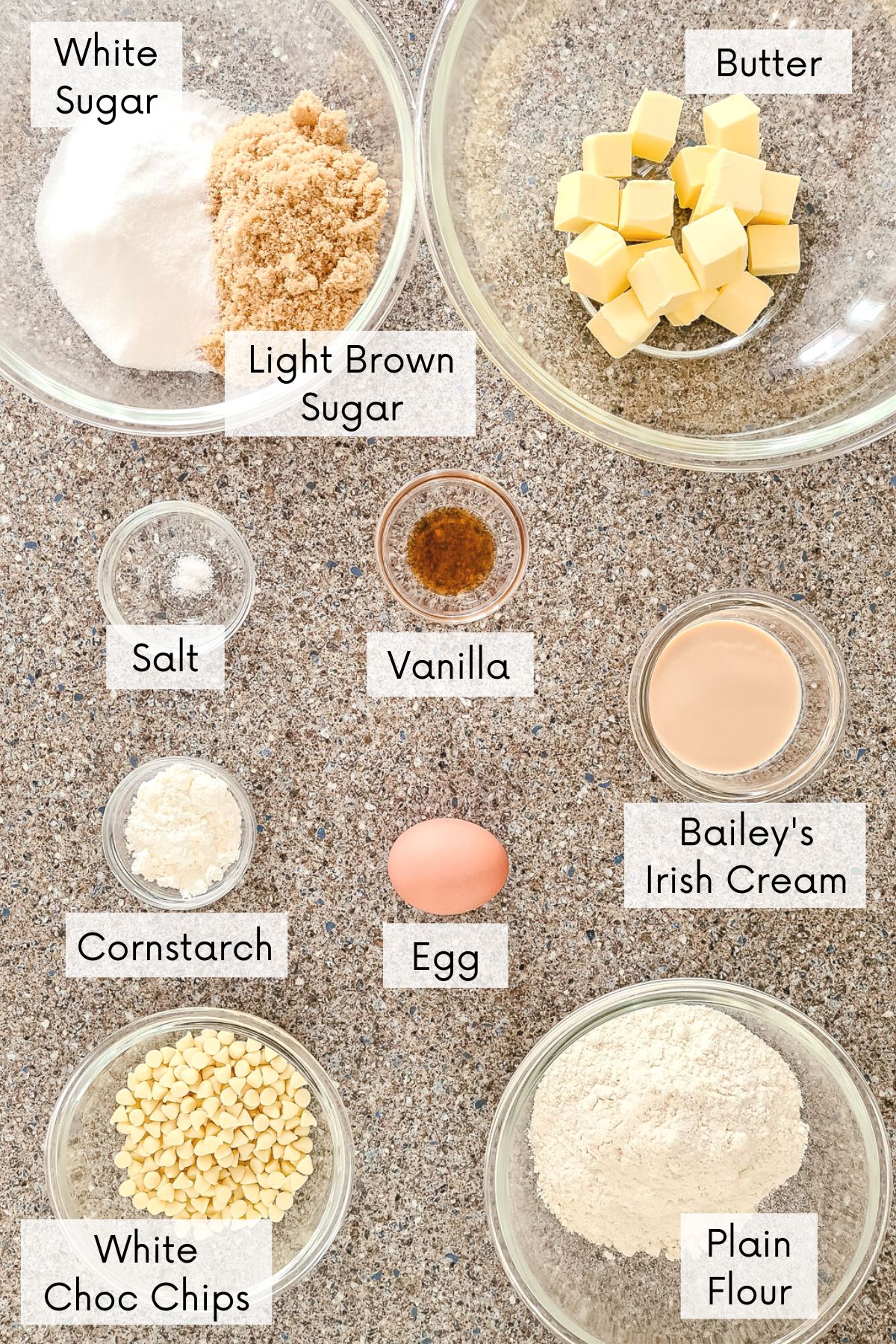 baileys irish cream white chocolate chips blondies recipe ingredients in bowls with labels.