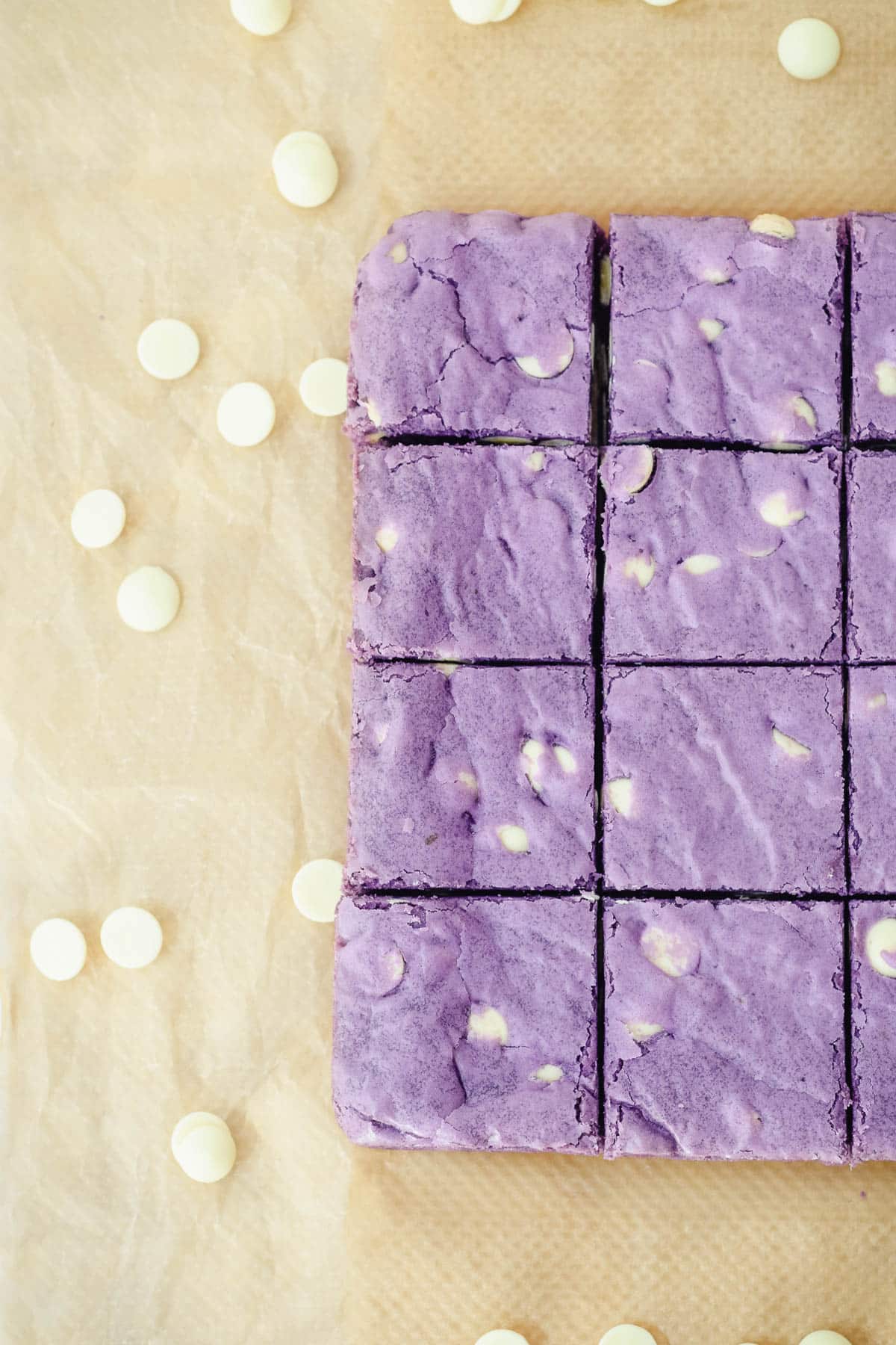 ube brownies squares with white chocolate chips.