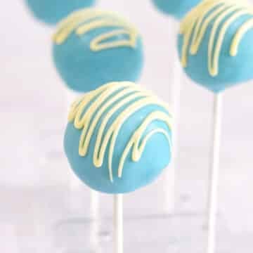 vanilla blue cake pops on sticks.