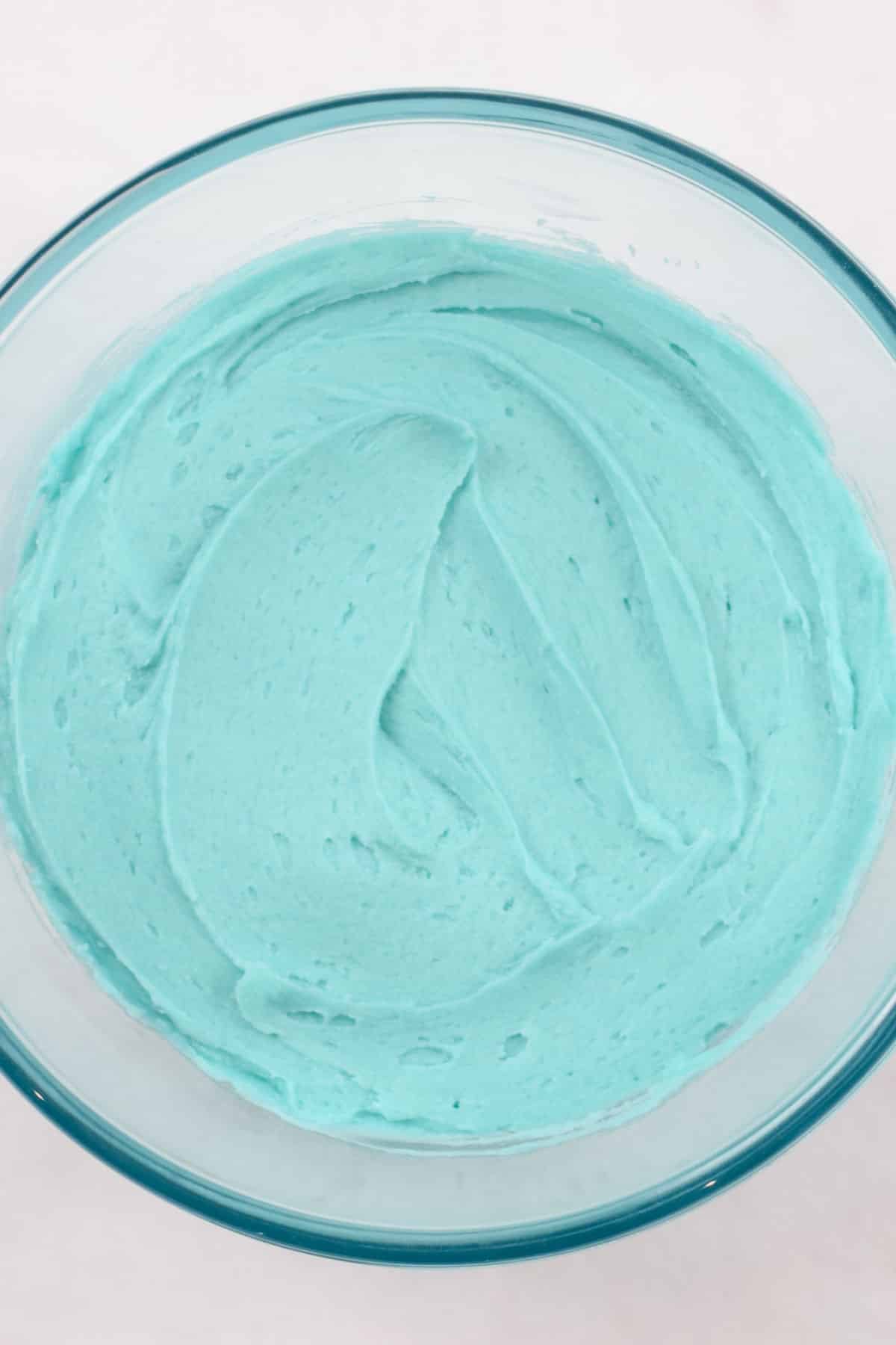 vanilla blue buttercream frosting in bowl.